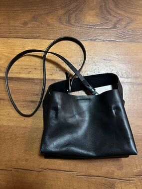 COS small leather bag made crossbody with top handle in black color leather